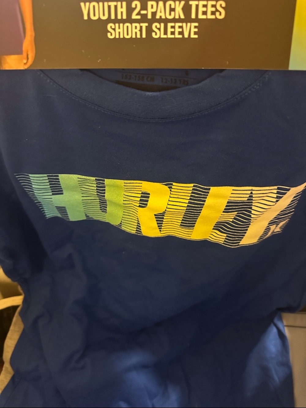 Hurley Navy Tee with Green-to-Yellow Gradient Logo